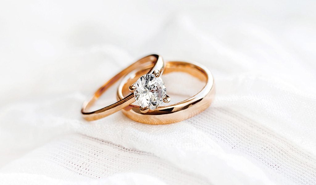 Rose gold wedding ring and engagement ring
